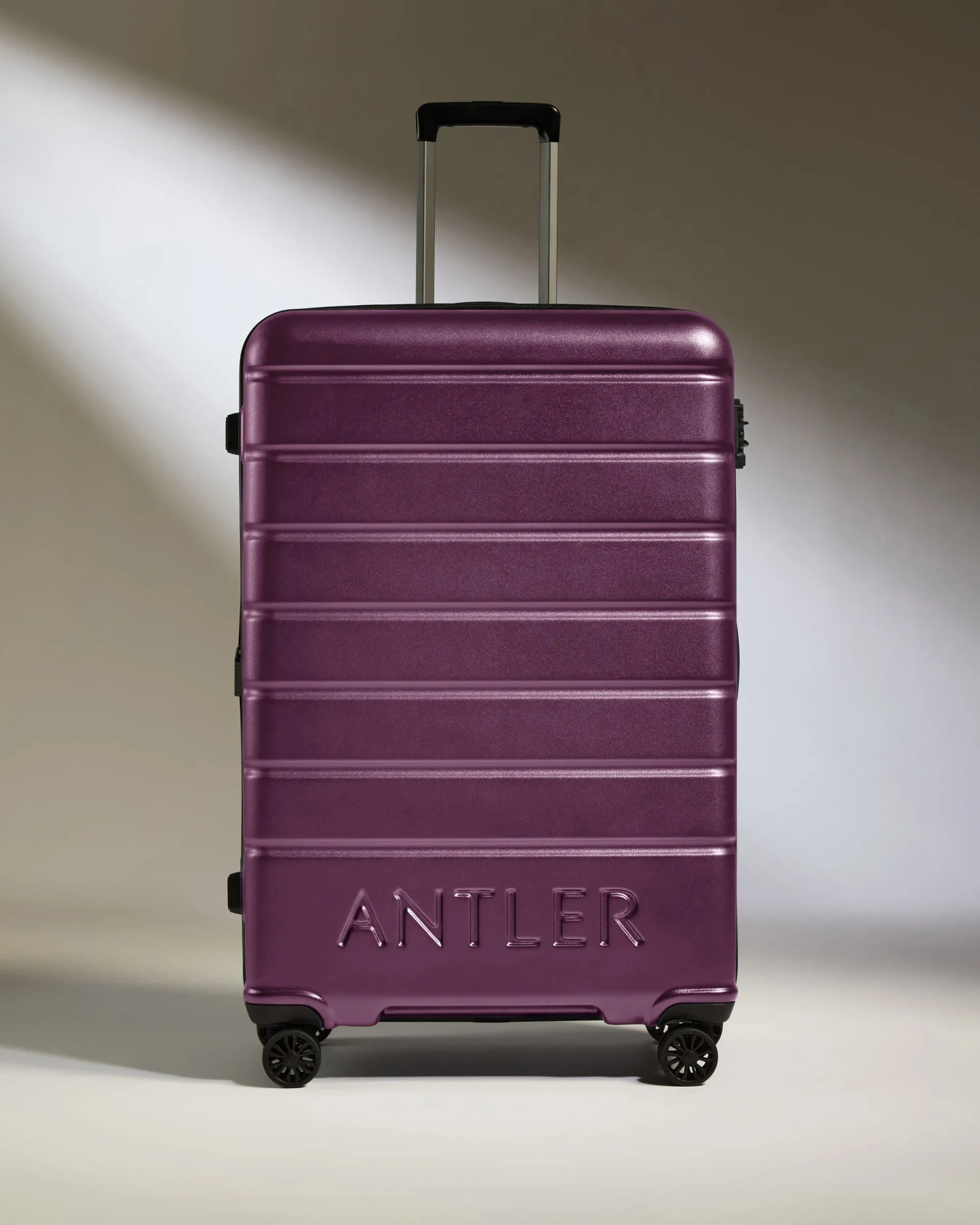 Large Luggage in Dark Heather Purple - Logo