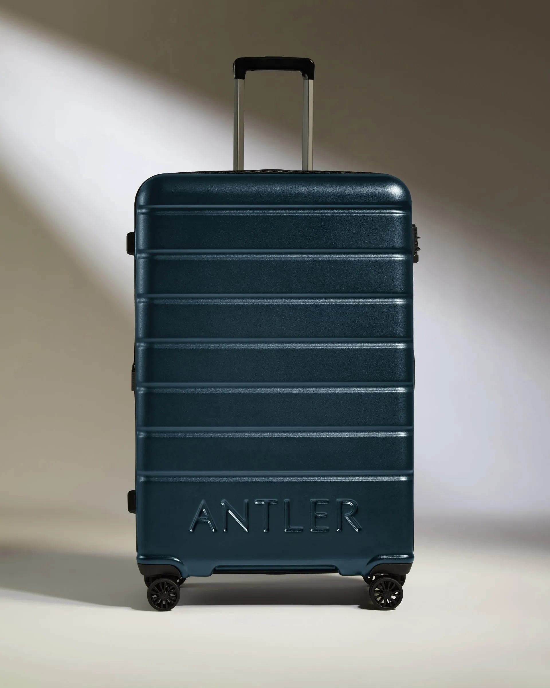 Large Luggage in Mid Blue - Logo