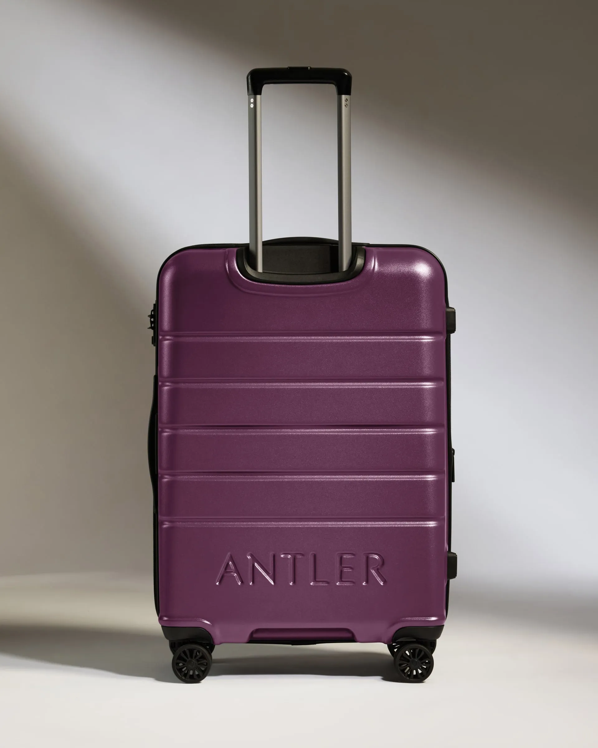Medium Luggage in Dark Heather Purple - Logo